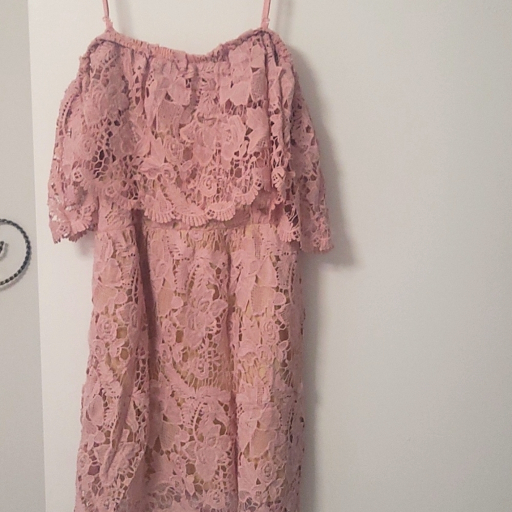 Off the shoulder lace dress by Romeo & Juliette Couture.